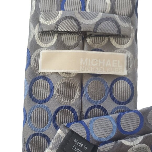 Michael Kors necktie 100% Silk, Blue, Grey & Silver circles on Grey 61"x 3.5" - Picture 2 of 5